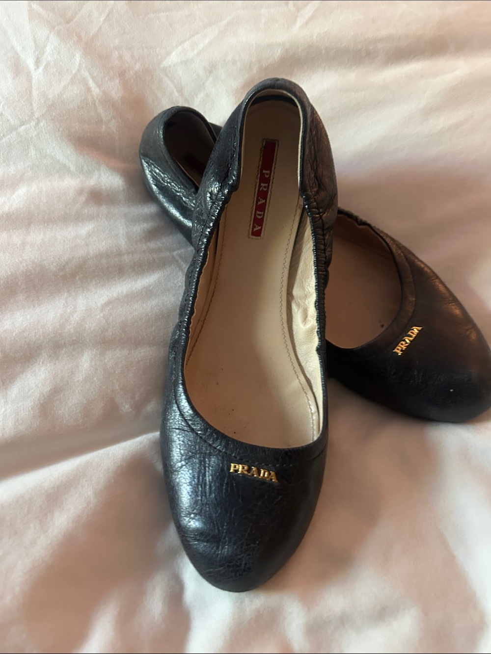 Prada Black Leather Ballet Flats with Gold Logo